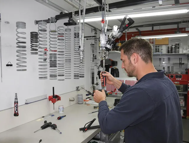 Avon Garage Door Repair safety certified technician performing precision spring replacement in Avon